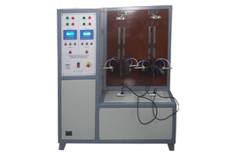 The tester is used for tesing abrasion for a hair straigtener by simulating the action by artificial means
